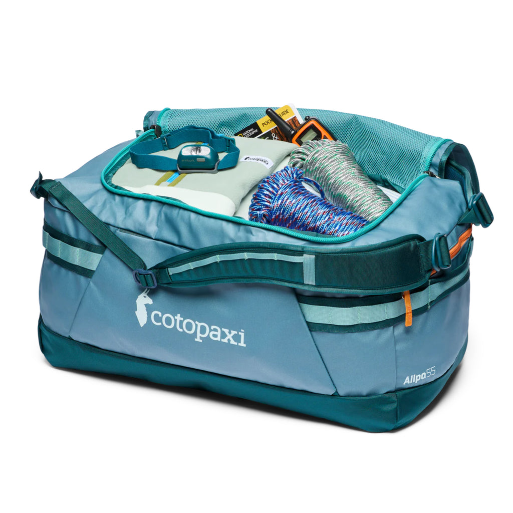 cotopaxi backpack duffel Allpa 50L Bag through over the handle of your rolling luggage. Cotopaxi Ligera 32L Duffel Bag